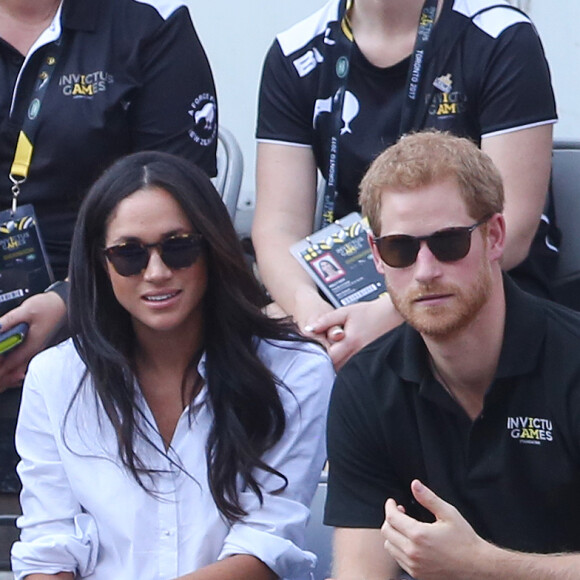 Première apparition officielle du prince Harry et sa compagne Meghan Markle dans les tribunes de la finale de tennis à la troisième édition des Invictus Games à Toronto, Ontario, Canada, le 25 septembre 2017. 