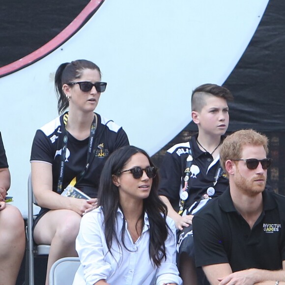 Première apparition officielle du prince Harry et sa compagne Meghan Markle dans les tribunes de la finale de tennis à la troisième édition des Invictus Games à Toronto, Ontario, Canada, le 25 septembre 2017. 
