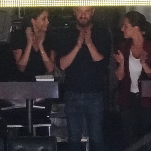 Meghan Markle assiste à la cérémonie de clôture des Invictus Games en compagnie de sa mère Doria Radland et de ses amis Jessica Mulroney et Markus Anderson à Toronto le 30 septembre 2017.