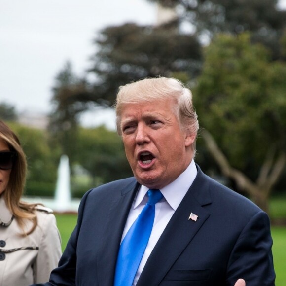 Le président Donald Trump et sa femme Melania arrivent à la Maison Blanche après leur voyage à Beltsville le 13 octobre 2017.