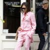Victoria Beckham, habillée d'une chemise et d'un pantalon Victoria Beckham (collection croisière 2018), et son fils Romeo quittent le magasin "What Goes Around Comes Around" à New York. Le 29 août 2017.