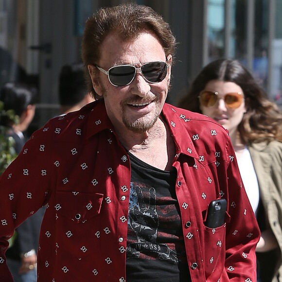 Johnny Hallyday avec sa femme Laeticia, leurs filles Jade et Joy, Marie Poniatowski avec son mari Pierre Rambaldi et leur fille Tess, à Santa Monica, le 1er avril 2017.