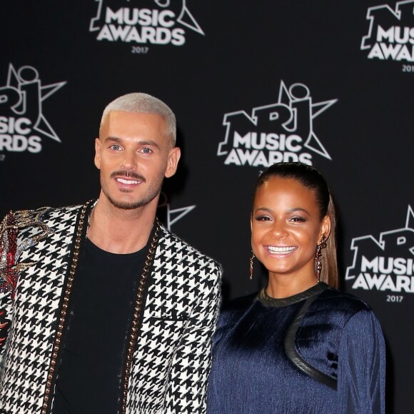 Le chanteur français M. Pokora (Matt Pokora) et sa compagne la chanteuse américaine Christina Milian lors des NRJ Music Awards 2017 à Cannes le 4 novembre 2017