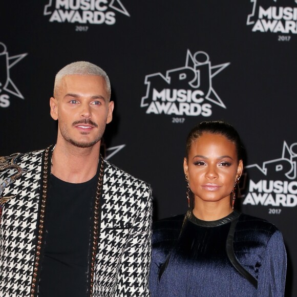 Le chanteur français M. Pokora (Matt Pokora) et sa compagne la chanteuse américaine Christina Milian lors des NRJ Music Awards 2017 à Cannes le 4 novembre 2017