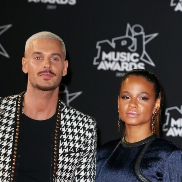Le chanteur français M. Pokora (Matt Pokora) et sa compagne la chanteuse américaine Christina Milian lors des NRJ Music Awards 2017 à Cannes le 4 novembre 2017