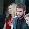 Miley Cyrus et son fiancé Liam Hemsworth, ensemble pour la première fois sur un tapis rouge depuis un an, à la première du film "Paranoia" à Los Angeles, le 8 août 2013.