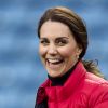 La duchesse Catherine de Cambridge (Kate Middleton), enceinte de 4 mois, lors d'une visite au stade d'Aston Villa à Birmingham le 22 novembre 2017 avec le prince William, pour un événement lié au programme Coach Core soutenu par leur fondation.