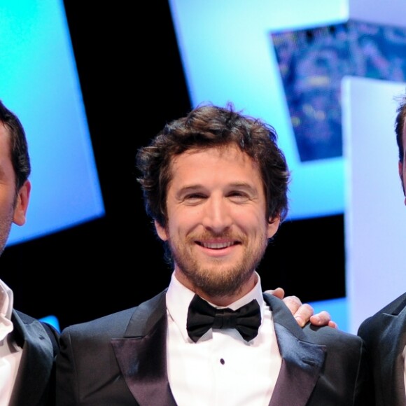 Gilles Lellouche, Guillaume Canet et Jean Dujardin à la 37e édition des César au Theâtre du Chatelet à Paris, le 24 février 2012