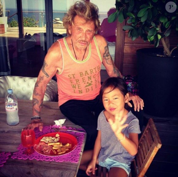 Johnny Hallyday et sa fille Jade lors de vacances à Saint-Barthélemy, Instagram, le 3 septembre 2013.