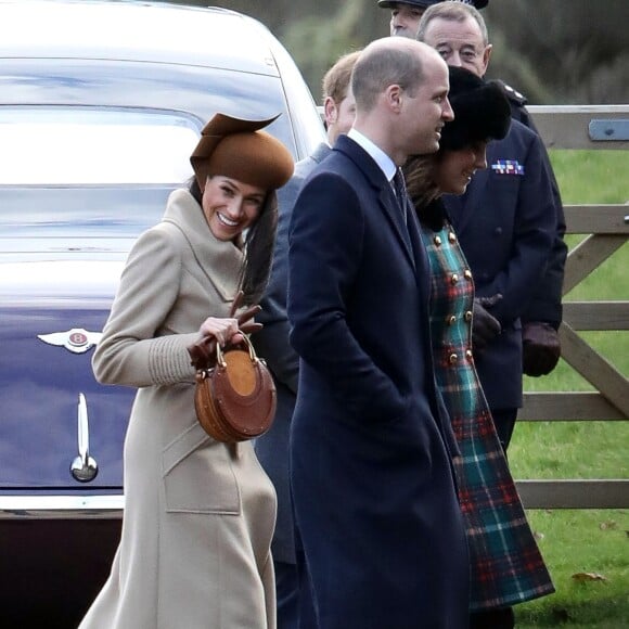 Exclusif - Meghan Markle et le prince Harry avec le prince William et la duchesse Catherine de Cambridge, enceinte, à la sortie de la messe de Noël en l'église Sainte-Marie-Madeleine à Sandringham, le 25 décembre 2017.