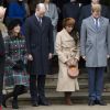Kate Middleton, enceinte, le prince William, Meghan Markle et le prince Harry faisant la révérence à la reine Elizabeth II au moment de son départ avec le duc d'Edimbourg suite à la messe de Noël en l'église Sainte-Marie-Madeleine le 25 décembre 2017 à Sandringham.