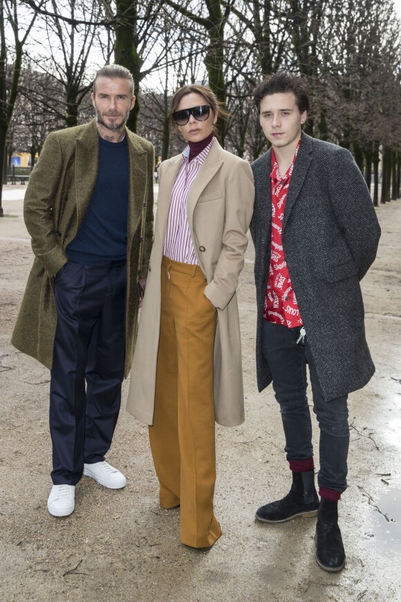 David Beckham, sa femme Victoria et leur fils Brooklyn au défilé de mode Louis Vuitton homme automne-hiver 2018-2019 au Palais Royal à Paris. Le 18 janvier 2018 © Olivier Borde / Bestimage