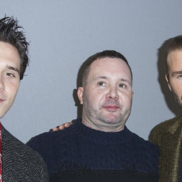 Kim Jones entouré de David Beckham et son fils Brooklyn - Backstage du défilé de mode Louis Vuitton homme automne-hiver 2018-2019 au Palais Royal à Paris. Le 18 janvier 2018 © Olivier Borde / Bestimage  