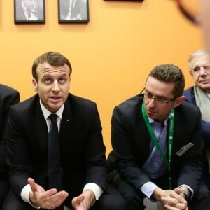 Le président de la république francaise, Emmanuel Macron accompagné de Stéphane Travert rencontre la filière des vins durant sa visite au salon de l'agriculture, Paris, France le 24 février 2018. © Stéphane Lemouton / Bestimage