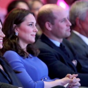 La duchesse Catherine de Cambridge, enceinte, et le prince William avec le prince Harry et Meghan Markle lors du premier forum de la Fondation royale, le 28 février 2018 à Londres.