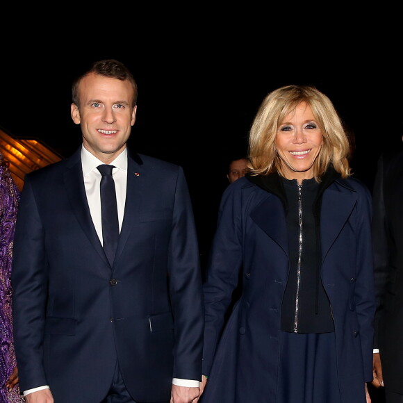 Le président de la République Emmanuel Macron et sa femme la Première Dame Brigitte Macron - Le président de la République française et sa femme la Première Dame sont accueillis par le président sénégalais et sa femme la Première Dame à l'aéroport international Léopold-Sédar-Senghor à Dakar, Sénégal, le 1er février 2018. © Dominique Jacovides/Bestimage 
