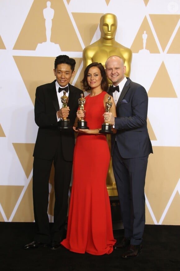 Kazuhiro Tsuji, Lucy Sibbick et David Malinowski (Oscar du meilleur maquillage et coiffure pour 'Les Heures sombres') à la press room de la 90ème cérémonie des Oscars 2018 au théâtre Dolby à Los Angeles, le 4 mars 2018
