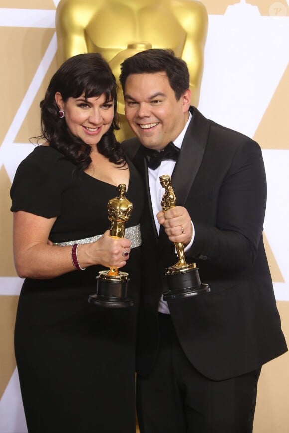 Kristen Anderson-Lopez et Robert Lopez (Oscar de la meilleure chanson pour 'Remember me' du film 'Coco') à la press room de la 90ème cérémonie des Oscars 2018 au théâtre Dolby à Los Angeles, le 4 mars 2018
