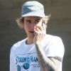 Exclusif - Justin Bieber téléphone dans la rue à Los Angeles puis remonte dans sa Lamborghini le 6 mars 2018. 06/03/2018 - Los Angeles