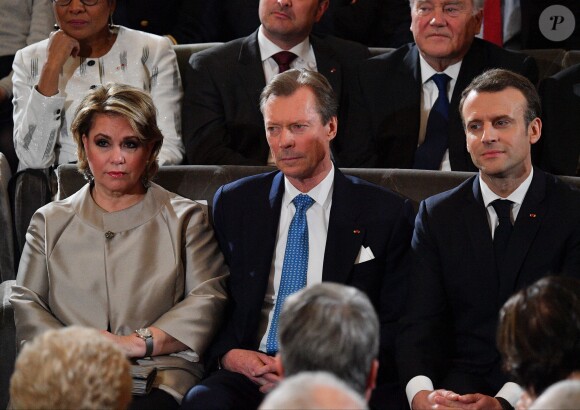 Emmanuel Macron, le grand-duc Henri et la grande-duchesse Maria Teresa de Luxembourg à l'Académie française à Paris, France, la 20 mars 2018. Le chef de l'État a énuméré une trentaine de mesures destinées à renforcer "la place et le rôle" de la langue française et du plurilinguisme dans le monde. © Christian Liewig/Pool/Bestimage