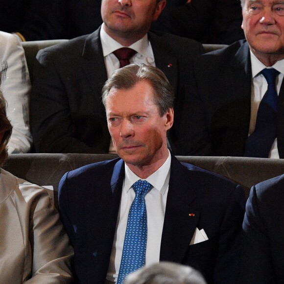 Emmanuel Macron, le grand-duc Henri et la grande-duchesse Maria Teresa de Luxembourg à l'Académie française à Paris, France, la 20 mars 2018. Le chef de l'État a énuméré une trentaine de mesures destinées à renforcer "la place et le rôle" de la langue française et du plurilinguisme dans le monde. © Christian Liewig/Pool/Bestimage