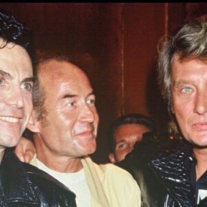 Johnny Hallyday en compagnie de Jean-Claude Jitrois et Gilles Lhote, le 15 novembre 1987.