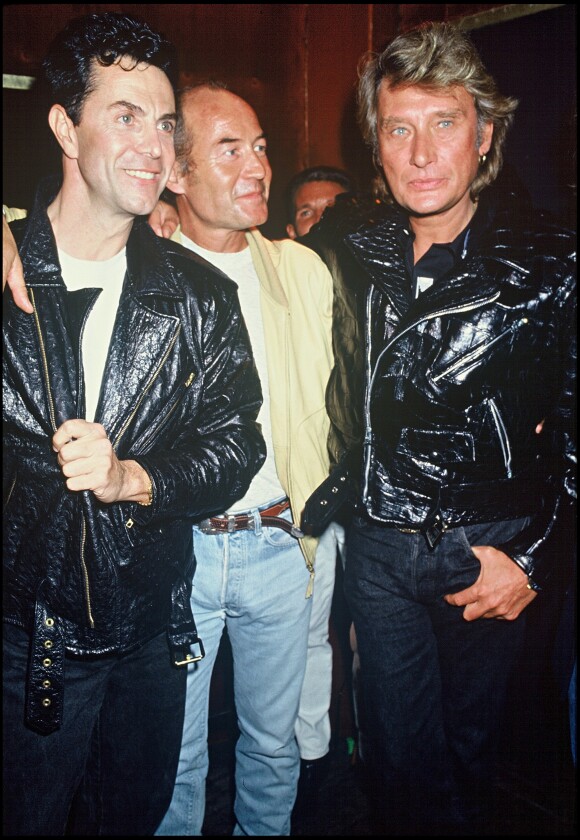 Johnny Hallyday en compagnie de Jean-Claude Jitrois et Gilles Lhote, le 15 novembre 1987.