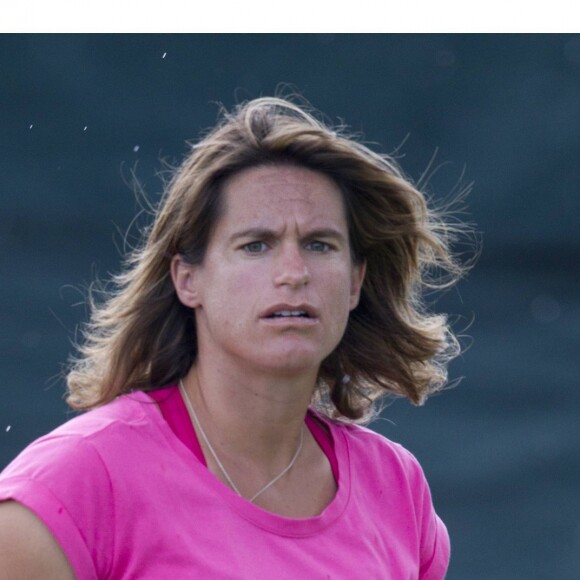 Andy Murray et son entraîneuse Amélie Mauresmo, enceinte lors de l'entraînement au tournoi de tennis de Wimbledon à Londres le 7 juillet 2015.