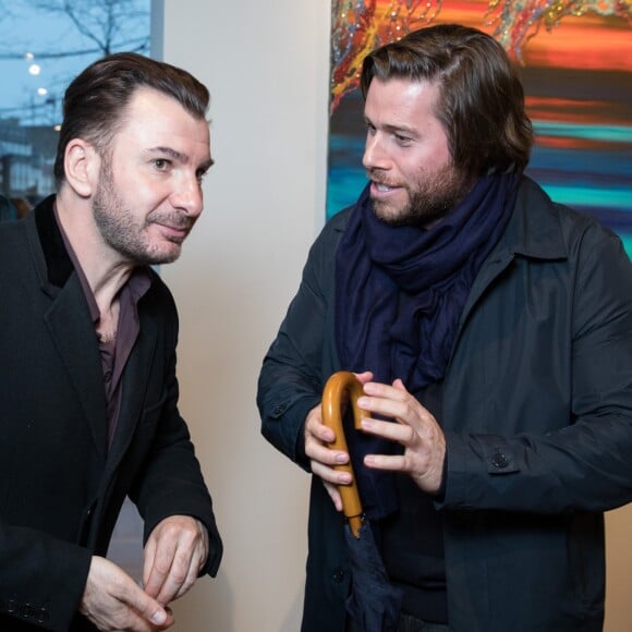 Exclusif - Michaël Youn et le producteur Julien Seul - Vernissage de l'exposition "Pluie d'étoiles" de la peintre Myriam Ghilan à la Galerie 89, à Paris le 29 mars 2018. © Cyril Moreau/Bestimage