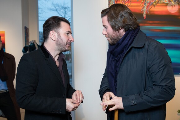 Exclusif - Michaël Youn et le producteur Julien Seul - Vernissage de l'exposition "Pluie d'étoiles" de la peintre Myriam Ghilan à la Galerie 89, à Paris le 29 mars 2018. © Cyril Moreau/Bestimage