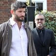 George Michael quitte son domicile avec son petit-ami Fadi Fawaz à Londres le 14 mars 2012