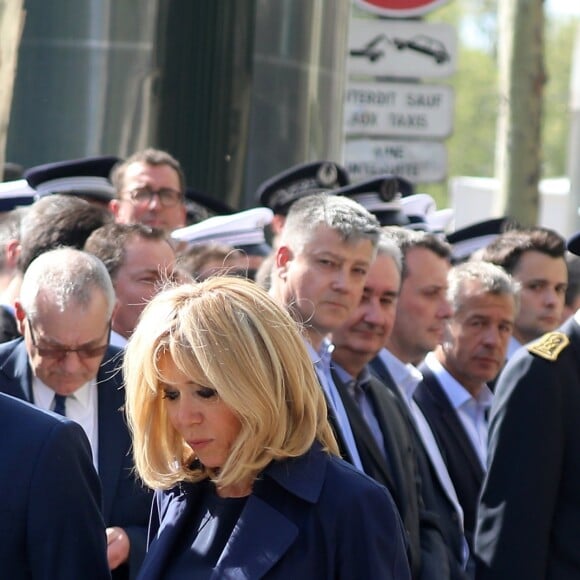 Le président Emmanuel Macron et Brigitte Macron lors de l'hommage à Xavier Jugelé sur les Champs Elysées, à Paris le 20 avril 2018. Une plaque a été dévoilée. © Dominique Jacovides / Bestimage