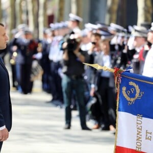 Le président de la République française Emmanuel Macron lors de l'hommage à Xavier Jugelé sur les Champs Elysées, à Paris le 20 avril 2018. Une plaque a été dévoilée. © Dominique Jacovides / Bestimage