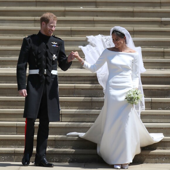 Le prince Harry, duc de Sussex, et Meghan Markle, duchesse de Sussex, à la sortie de chapelle St. George au château de Windsor - Sortie après la cérémonie de mariage du prince Harry et de Meghan Markle en la chapelle Saint-George au château de Windsor, Royaume Uni, le 19 mai 2018.