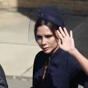 David Beckham et sa femme Victoria - Les invités arrivent à la chapelle St. George pour le mariage du prince Harry et de Meghan Markle au château de Windsor, Royaume Uni, le 19 mai 2018.