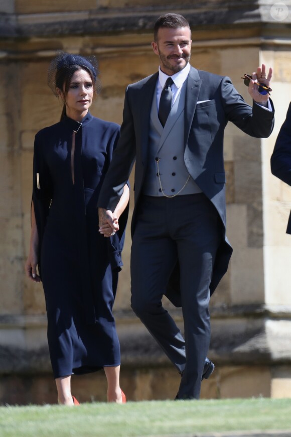 David et Victoria Beckham - Les invités arrivent à la chapelle St. George pour le mariage du prince Harry et de Meghan Markle au château de Windsor, Royaume, Uni, le 19 mai 2018.
