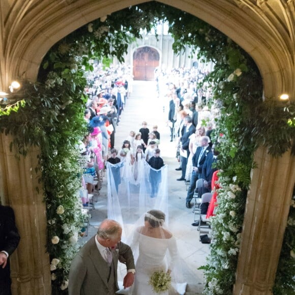 Le prince Charles a conduit Meghan Markle, duchesse de Sussex, à l'autel lors de son mariage avec le prince Harry le 19 mai 2018 à Windsor.