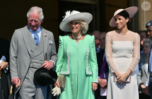 La duchesse Meghan de Sussex (Meghan Markle), vêtue d'une robe Goat, et le prince Harry prenaient part le 22 mai 2018 à une garden party organisée dans les jardins de Buckingham Palace dans le cadre des célébrations du 70e anniversaire du prince Charles. A cinq mois de la date (14 novembre 2018), le rassemblement honorait ses patronages, associations et rôles militaires.