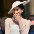  La duchesse Meghan de Sussex le 22 mai 2018 à une garden party organisée dans les jardins de Buckingham Palace dans le cadre des célébrations du 70e anniversaire du prince Charles. A cinq mois de la date (14 novembre 2018), le rassemblement honorait ses patronages, associations et rôles militaires. 