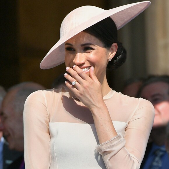 La duchesse Meghan de Sussex le 22 mai 2018 à une garden party organisée dans les jardins de Buckingham Palace dans le cadre des célébrations du 70e anniversaire du prince Charles. A cinq mois de la date (14 novembre 2018), le rassemblement honorait ses patronages, associations et rôles militaires.