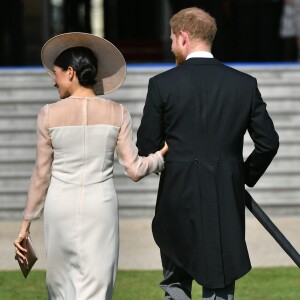 La duchesse Meghan de Sussex (Meghan Markle), vêtue d'une robe Goat, et le prince Harry prenaient part le 22 mai 2018 à une garden party organisée dans les jardins de Buckingham Palace dans le cadre des célébrations du 70e anniversaire du prince Charles. A cinq mois de la date (14 novembre 2018), le rassemblement honorait ses patronages, associations et rôles militaires.