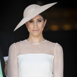 La duchesse Meghan de Sussex, vêtue d'une robe Goat, et le prince Harry prenaient part le 22 mai 2018 à une garden party organisée dans les jardins de Buckingham Palace dans le cadre des célébrations du 70e anniversaire du prince Charles. A cinq mois de la date (14 novembre 2018), le rassemblement honorait ses patronages, associations et rôles militaires.