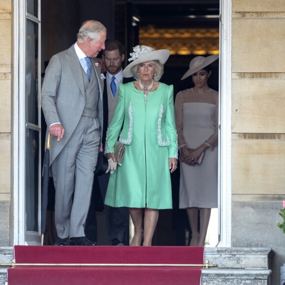 La duchesse Meghan de Sussex (Meghan Markle), vêtue d'une robe Goat, et le prince Harry prenaient part le 22 mai 2018 à une garden party organisée dans les jardins de Buckingham Palace dans le cadre des célébrations du 70e anniversaire du prince Charles. A cinq mois de la date (14 novembre 2018), le rassemblement honorait ses patronages, associations et rôles militaires.