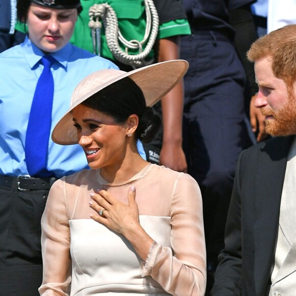 La duchesse Meghan de Sussex (Meghan Markle), vêtue d'une robe Goat, et le prince Harry prenaient part le 22 mai 2018 à une garden party organisée dans les jardins de Buckingham Palace dans le cadre des célébrations du 70e anniversaire du prince Charles. A cinq mois de la date (14 novembre 2018), le rassemblement honorait ses patronages, associations et rôles militaires.