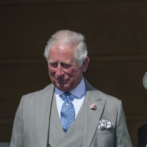 La duchesse Meghan de Sussex (Meghan Markle), vêtue d'une robe Goat, et le prince Harry prenaient part le 22 mai 2018 à une garden party organisée dans les jardins de Buckingham Palace dans le cadre des célébrations du 70e anniversaire du prince Charles. A cinq mois de la date (14 novembre 2018), le rassemblement honorait ses patronages, associations et rôles militaires.