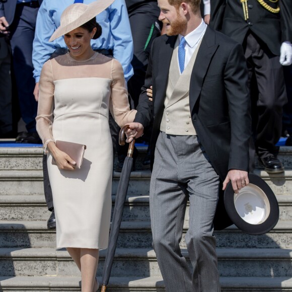 La duchesse Meghan de Sussex (Meghan Markle), vêtue d'une robe Goat, et le prince Harry prenaient part le 22 mai 2018 à une garden party organisée dans les jardins de Buckingham Palace dans le cadre des célébrations du 70e anniversaire du prince Charles. A cinq mois de la date (14 novembre 2018), le rassemblement honorait ses patronages, associations et rôles militaires.