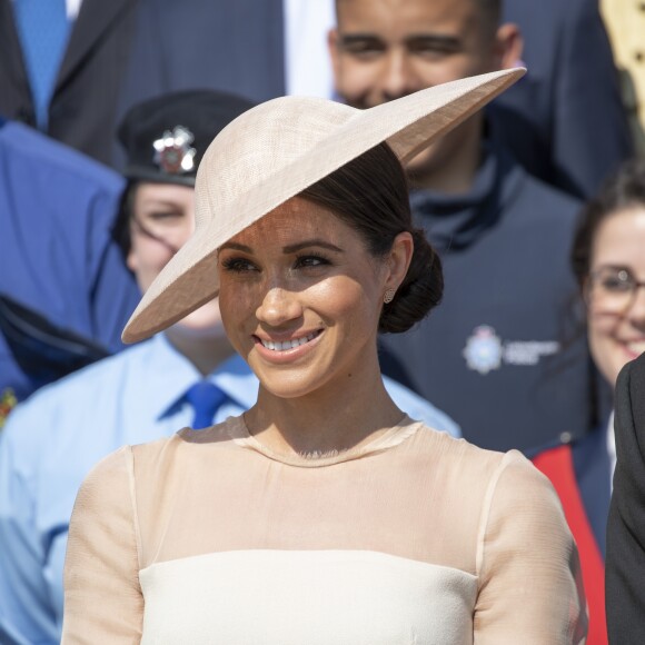 La duchesse Meghan de Sussex (Meghan Markle), vêtue d'une robe Goat, et le prince Harry prenaient part le 22 mai 2018 à une garden party organisée dans les jardins de Buckingham Palace dans le cadre des célébrations du 70e anniversaire du prince Charles. A cinq mois de la date (14 novembre 2018), le rassemblement honorait ses patronages, associations et rôles militaires.