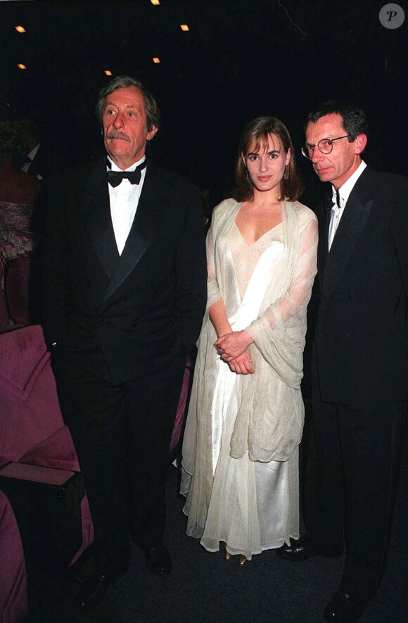 Jean Rochefort, Judith Godrèche et Patrice Leconte au dîner d'ouverture du 49e Festival de Cannes en mai 1996