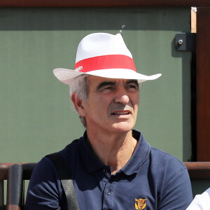 Raymond Domenech dans les tribunes des internationaux de tennis de Roland Garros à Paris, France, le 3 juin 2018. © Dominique Jacovides - Cyril Moreau