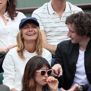 Axelle Laffont et Baptiste Lecaplain dans les tribunes des internationaux de tennis de Roland Garros à Paris, France, le 5 juin 2018.